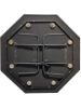Underside of black octagonal poker table with folding legs